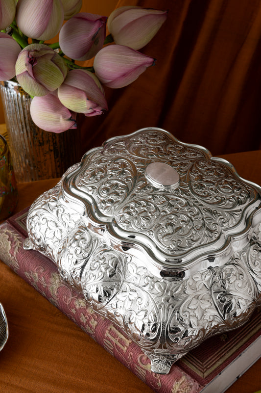 Luxury Silver Plated Vintage Jewellery Box with embossed design and rose quartz accent displayed in an elegant home décor setting by Silverstein.